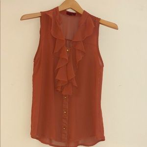 Super cute rust ruffled women’s sheer blouse